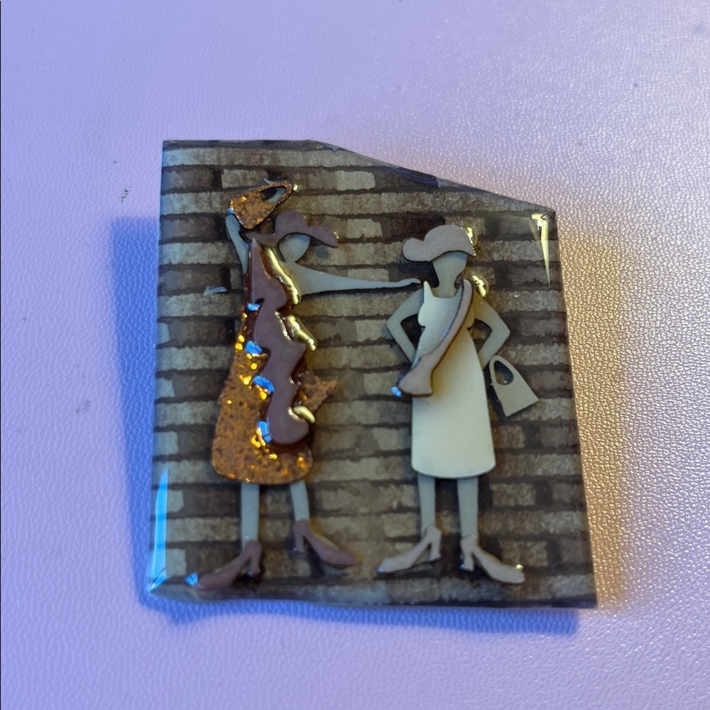 Lucinda vintage glossy brooch pin of two ladies shopping.